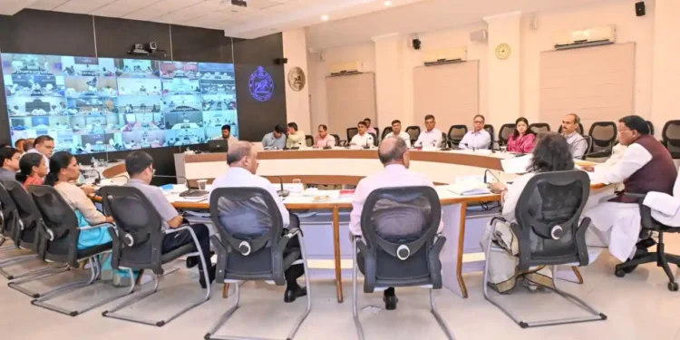 Chief Minister Mohan Charan Majhi chairs a meeting with district officials in Bhubaneswar, directing DMs to ensure uninterrupted supply of essential goods and curb misinformation amid the West Asia crisis.